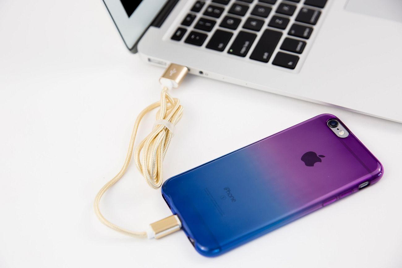 Apple iPhone MacBook with gold